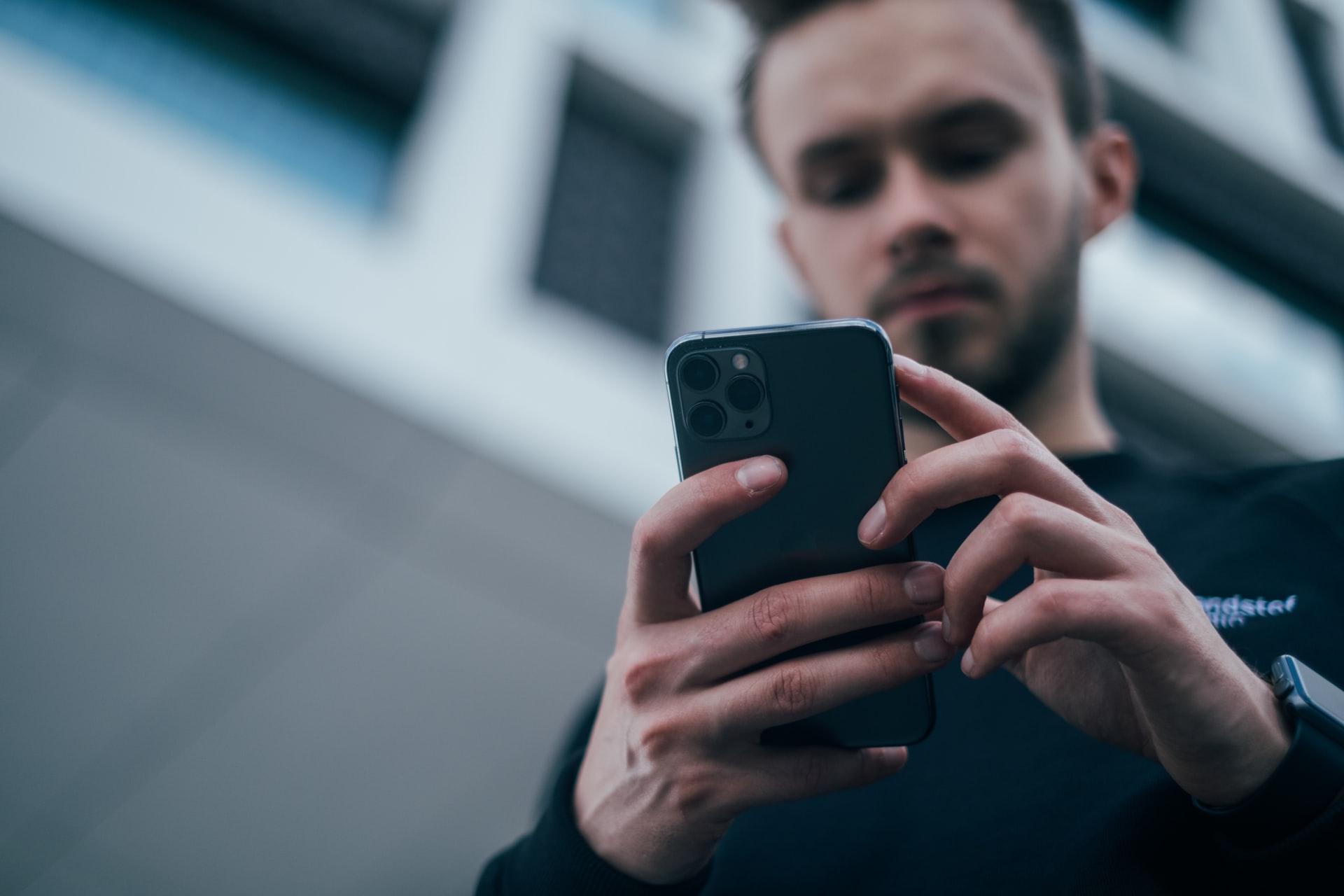 A man using a smartphone.