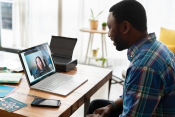 A man and woman having a video call.