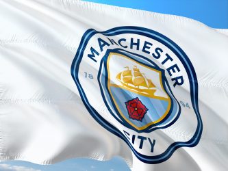 A Manchester City FC flag.