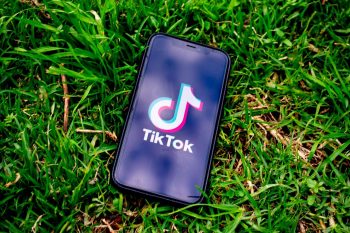 TikTok logo on a smartphone.
